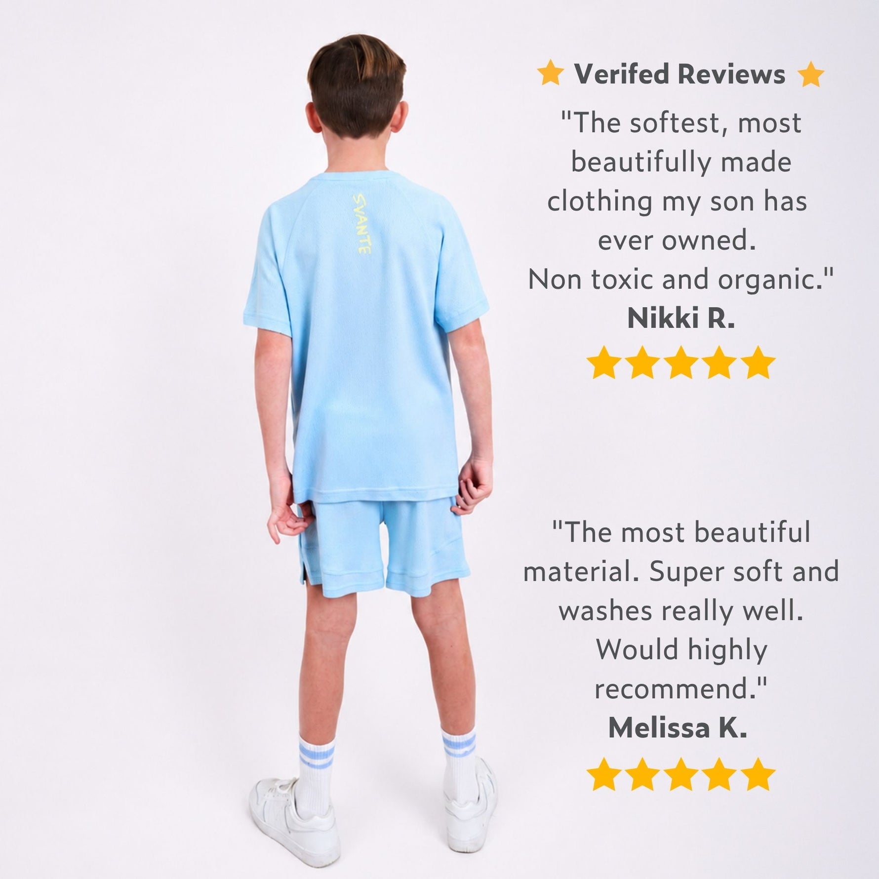 Boy wearing a light blue natural material plastic free sports shorts and T-shirt set  outfit with positive reviews displayed on a white background