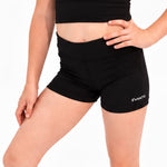Black athletic shorts with a white 'SVANTE' logo on the lower left hem, shown on a model against a white background.