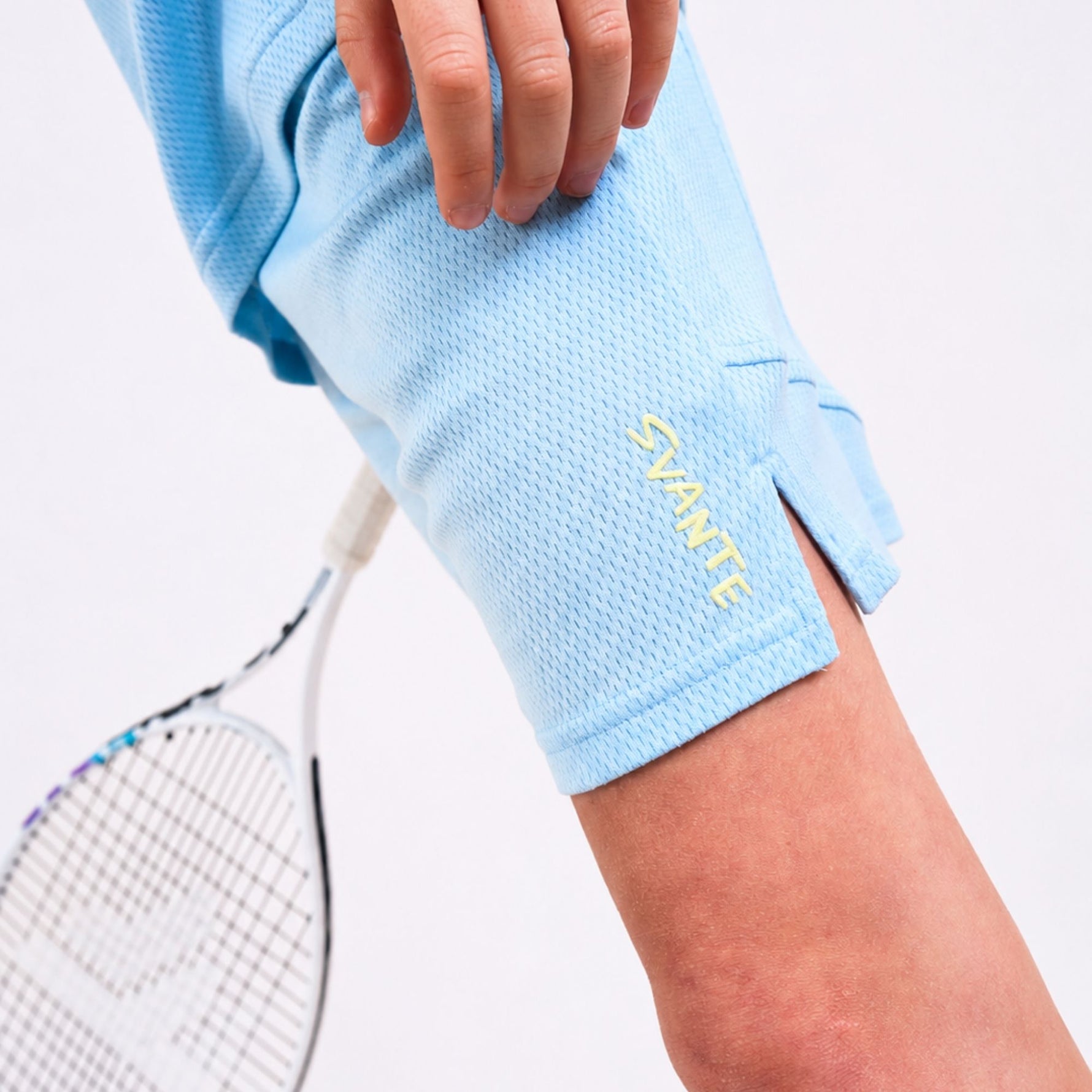 Boys Light blue polyester free sports shorts support with 'Svante' branding on a white background