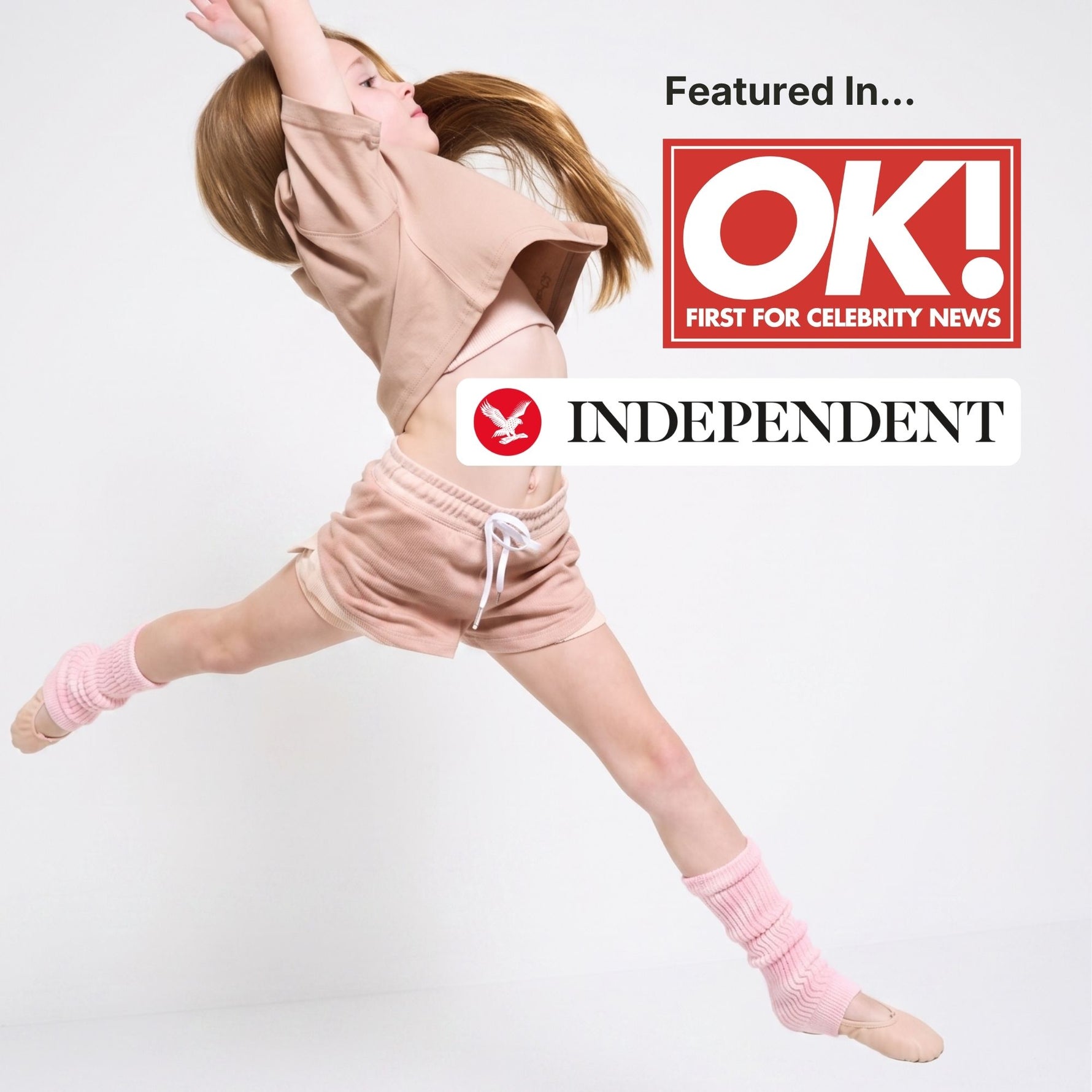 Dancer in pink polyester free sports shorts and pink organic cotton crop t-shirt with OK! Independent logo on a white background.  